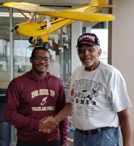 Jaiden Hughes with Rev. Dr. Samuel J. Murray